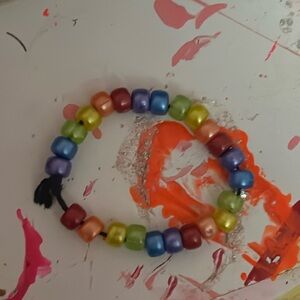 Rainbow plastic Kandi bracelet